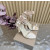 Christian Louboutin Champagne Satin 100mm Ankle‑Wrap Tie Stiletto Sandals