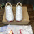 Christian Louboutin White Leather Gold‑Logo Lace‑Up Sneakers Red Shark‑Tooth Sole