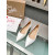 Christian Louboutin White Patent Leather Pointed‑Toe Low‑Wedge Heel Flats