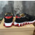 Christian Louboutin Black Leather Gold‑Logo Lace‑Up Sneakers Red Shark‑Tooth Sole