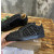 Christian Louboutin Black Monogram‑Print Spike‑Embellished Low‑Top Sneakers