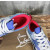 Christian Louboutin White‑Blue Denim Spiked Platform Low‑Top Sneakers