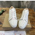 Christian Louboutin White Leather All‑Over Spike Low‑Top Sneakers