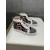 Christian Louboutin Black Patent Geometric‑Print Spiked High‑Top Sneakers