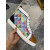 Christian Louboutin Multicolor Geometric Print High‑Top Sneakers