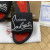 Christian Louboutin Black Rubber Slide Sandals White Signature Logo Print