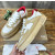 Christian Louboutin Tan‑White Leather Mesh Spiked Platform Low‑Top Sneakers