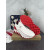 Christian Louboutin White‑Red Leather Slip‑On Spiked Sneakers Red Shark‑Tooth Sole