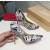 Christian Louboutin Monochrome Letter‑Print Pointed Toe 100mm Stiletto heel Pumps