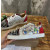 Christian Louboutin Graffiti Print Mixed‑Media Spike Low‑Top Sneakers