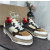 Christian Louboutin Brown‑White Suede‑Mesh Spiked Platform Lace‑Up Sneakers