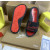 Christian Louboutin Black Slide Sandals With Red Embossed Signature Logo